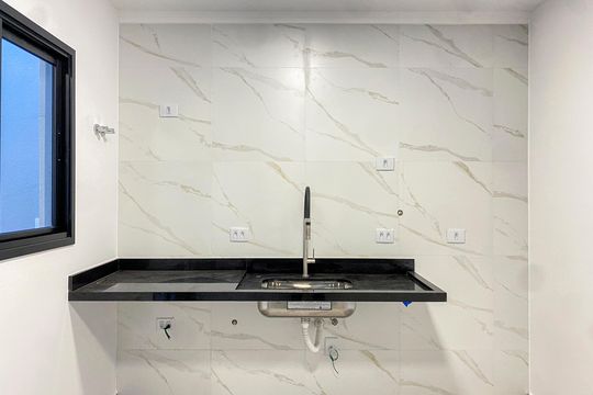 Cozinha de casa de condomínio à venda com 2 quartos, 65m² em Tremembé, São Paulo