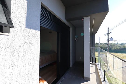 Sacada da Suíte  de casa de condomínio para alugar com 2 quartos, 196m² em Mário Quintana, Viamão