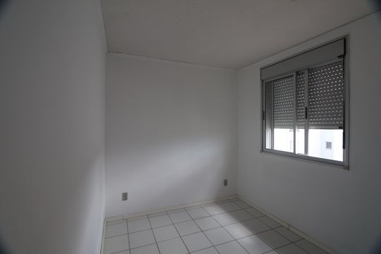 Quarto 2 de apartamento para alugar com 2 quartos, 48m² em Guajuviras, Canoas