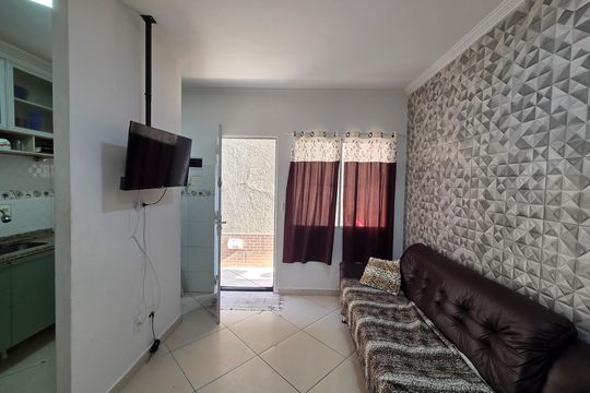 Sala de casa de condomínio para alugar com 1 quarto, 60m² em Cidade Ocian, Praia Grande