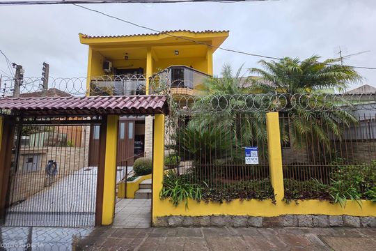 Fachada de casa à venda com 4 quartos, 259m² em Jardim Itu, Porto Alegre