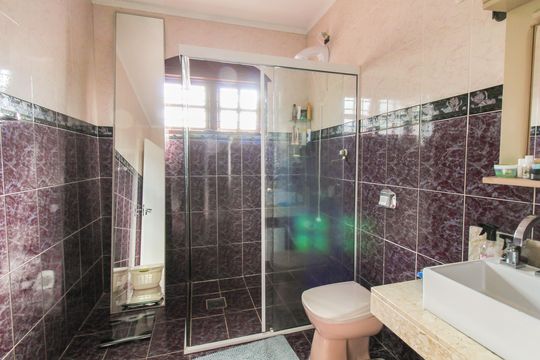 Banheiro 1 de casa para alugar com 3 quartos, 193m² em Mathias Velho, Canoas