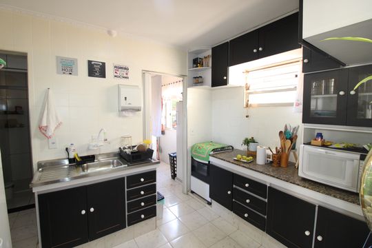 Sala / Cozinha de apartamento à venda com 2 quartos, 54m² em Conjunto Residencial José Bonifácio, São Paulo