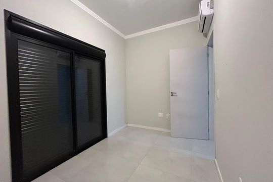 Quarto 1 de casa para alugar com 3 quartos, 100m² em Campeche Central, Florianópolis