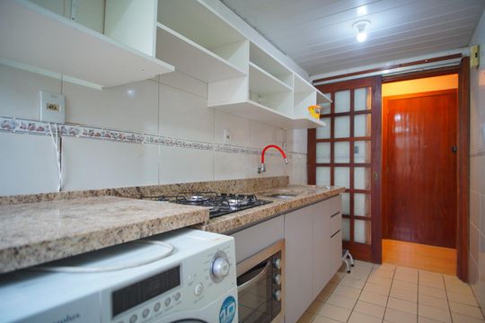 Cozinha de apartamento à venda com 2 quartos, 52m² em Sarandi, Porto Alegre