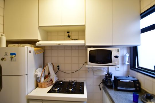 Cozinha de apartamento à venda com 1 quarto, 65m² em Cambuí, Campinas