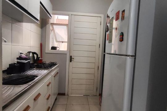 Cozinha de casa de condomínio para alugar com 2 quartos, 48m² em Formoza, Alvorada