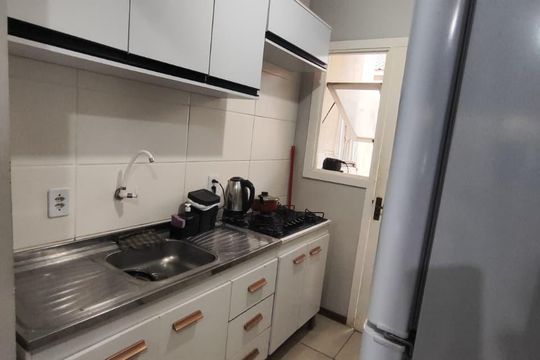Cozinha de casa de condomínio para alugar com 2 quartos, 48m² em Formoza, Alvorada