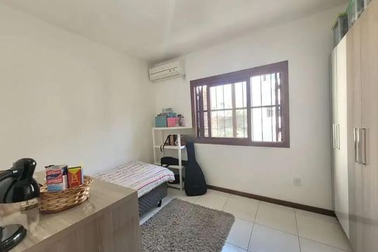 Quarto 1 de casa para alugar com 3 quartos, 116m² em Hípica, Porto Alegre