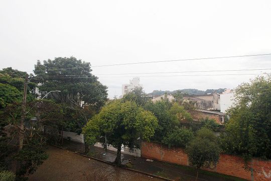 Cozinha + Área de Serviço Vista de apartamento à venda com 2 quartos, 70m² em Azenha, Porto Alegre