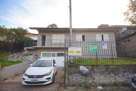 Fachada de casa à venda com 3 quartos, 180m² em Vila Nova, Novo Hamburgo