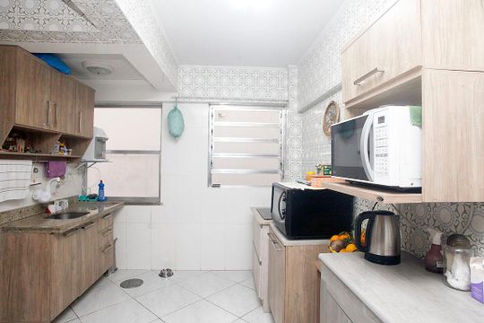 Cozinha de apartamento à venda com 2 quartos, 80m² em Menino Deus, Porto Alegre