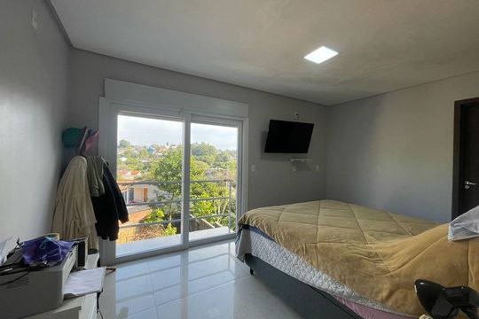 Suíte de casa à venda com 3 quartos, 135m² em Petrópolis, Novo Hamburgo