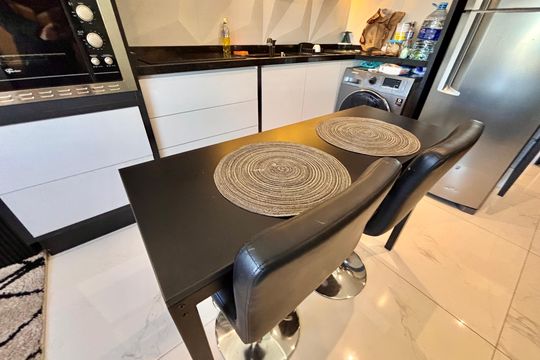 Cozinha  de apartamento à venda com 1 quarto, 33m² em Jardins, São Paulo