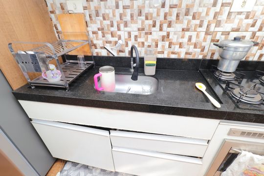 Cozinha e Área de Serviço de apartamento à venda com 2 quartos, 75m² em Conjunto Residencial José Bonifácio, São Paulo