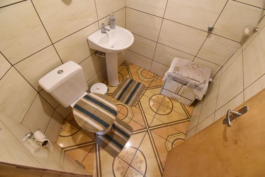 Banheiro externo de casa à venda com 3 quartos, 120m² em Bairro Alto, Curitiba