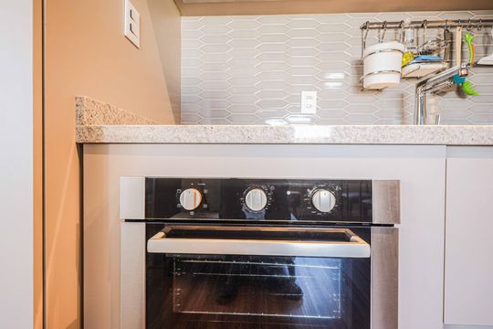 Cozinha de apartamento à venda com 1 quarto, 44m² em Petrópolis, Porto Alegre