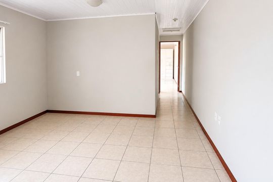 Sala de casa de condomínio para alugar com 3 quartos, 113m² em Jardim Atlântico, Florianópolis