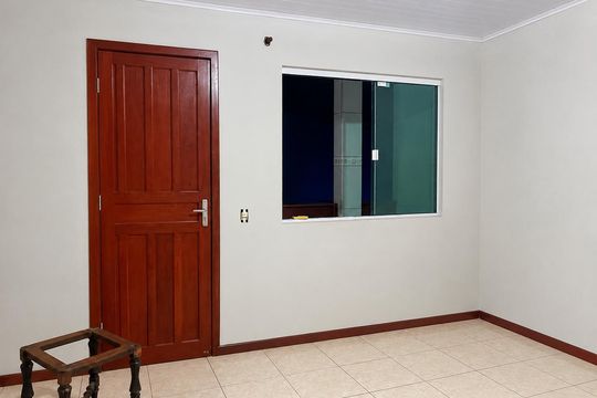 Sala de casa de condomínio para alugar com 3 quartos, 113m² em Jardim Atlântico, Florianópolis