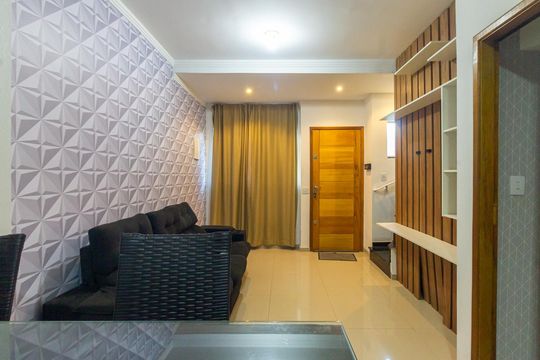 Sala/Cozinha  de casa de condomínio para alugar com 2 quartos, 90m² em Vila Granada, São Paulo