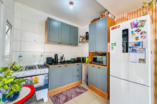 Cozinha de casa de condomínio à venda com 2 quartos, 110m² em Fátima, Canoas
