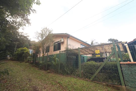 fachada lateral de casa à venda com 6 quartos, 330m² em Vila Nova, Novo Hamburgo