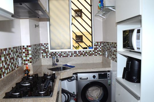 Cozinha e Área de Serviço de apartamento à venda com 2 quartos, 51m² em Pousada Santo Antonio, Belo Horizonte