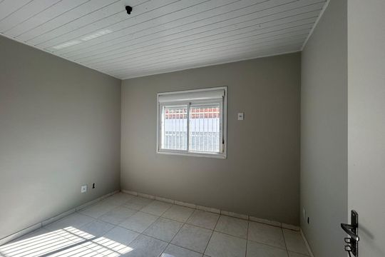 Quarto 1 de casa de condomínio à venda com 2 quartos, 45m² em Fátima, Canoas