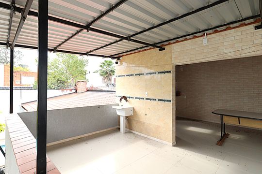 Sobrado - Área de serviço de casa para alugar com 5 quartos, 262m² em São Geraldo, Porto Alegre