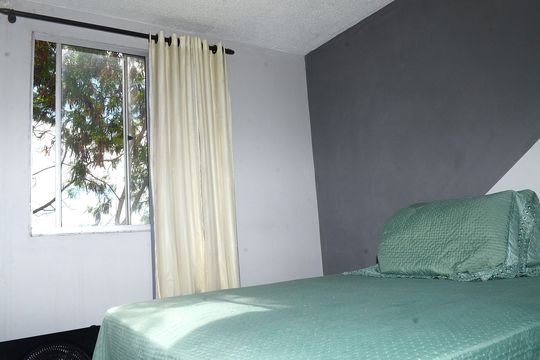 Quarto 1 de apartamento para alugar com 2 quartos, 43m² em Vista do Sol, Belo Horizonte