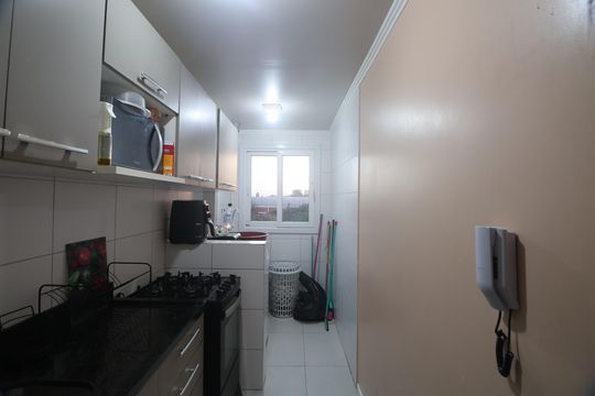 Cozinha e Área de Serviço de apartamento à venda com 2 quartos, 61m² em Niterói, Canoas