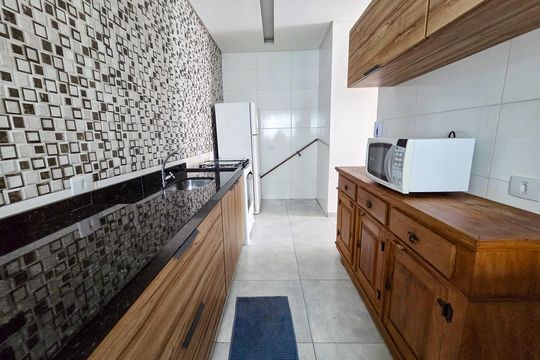 Cozinha de casa de condomínio para alugar com 2 quartos, 74m² em Nova Mirim, Praia Grande