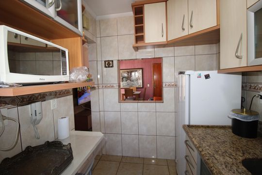 Cozinha de apartamento à venda com 2 quartos, 48m² em Vila Regina, São Paulo