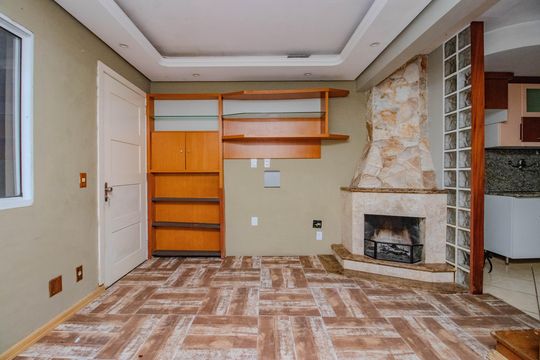 Sala de casa de condomínio para alugar com 3 quartos, 74m² em Humaitá, Porto Alegre