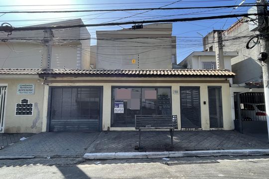 Fachada+Placa  de casa de condomínio para alugar com 3 quartos, 102m² em Vila Granada, São Paulo