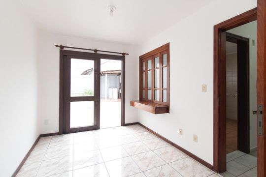 Sala de casa de condomínio à venda com 3 quartos, 126m² em Cavalhada, Porto Alegre
