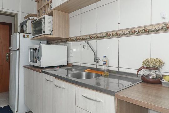Cozinha de apartamento à venda com 1 quarto, 54m² em Jardim Sabará, Porto Alegre