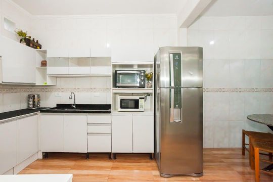 Cozinha de casa de condomínio à venda com 4 quartos, 120m² em Uberaba, Curitiba