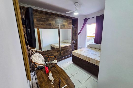Suíte 1 de apartamento para alugar com 3 quartos, 117m² em Vila Tupi, Praia Grande