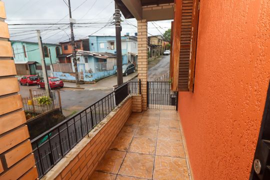 Hall de entrada de casa à venda com 5 quartos, 210m² em Vila Nova, Porto Alegre