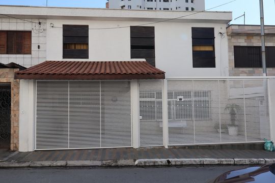 Fachada e portão de casa à venda com 3 quartos, 103m² em Vila Prudente, São Paulo