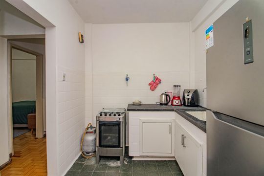 Cozinha e Área de Serviço de apartamento à venda com 1 quarto, 76m² em Floresta, Porto Alegre