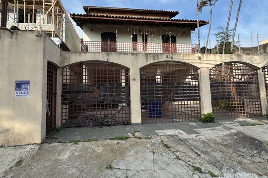 Fachada com Placa de casa à venda com 5 quartos, 411m² em City Bussocaba, Osasco