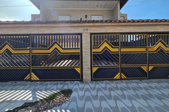 Fachada de casa de condomínio para alugar com 1 quarto, 60m² em Parque das Americas, Praia Grande