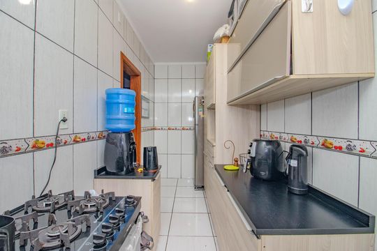 Cozinha e Área de Serviço de apartamento à venda com 2 quartos, 55m² em Passo D’areia, Porto Alegre