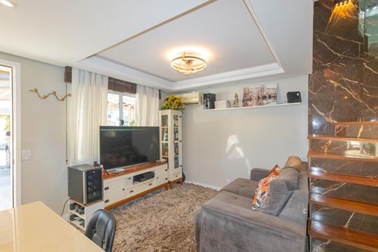 Sala de casa de condomínio à venda com 3 quartos, 89m² em Rio Branco, Canoas