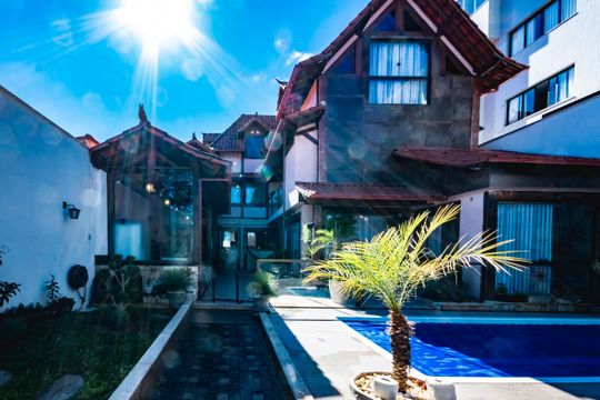Fachada de casa à venda com 3 quartos, 472m² em Planalto, Belo Horizonte