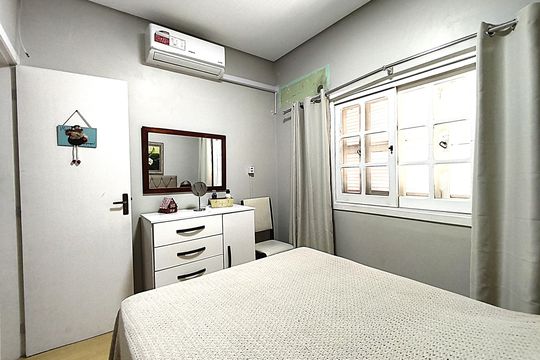 Quarto 1 de casa de condomínio à venda com 3 quartos, 162m² em Guarujá, Porto Alegre