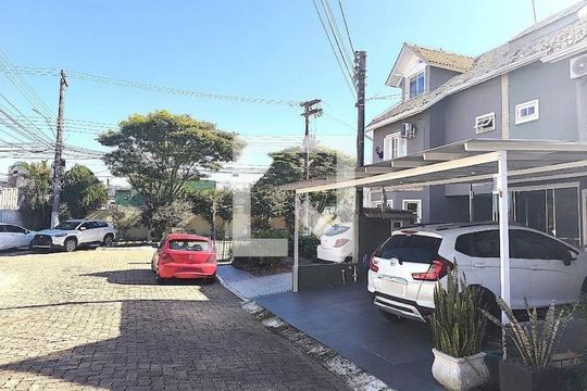 Garagem de casa de condomínio à venda com 3 quartos, 162m² em Guarujá, Porto Alegre