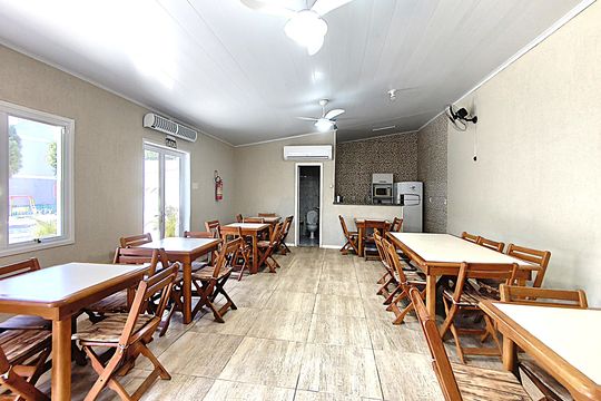 Área externa de casa de condomínio à venda com 3 quartos, 162m² em Guarujá, Porto Alegre